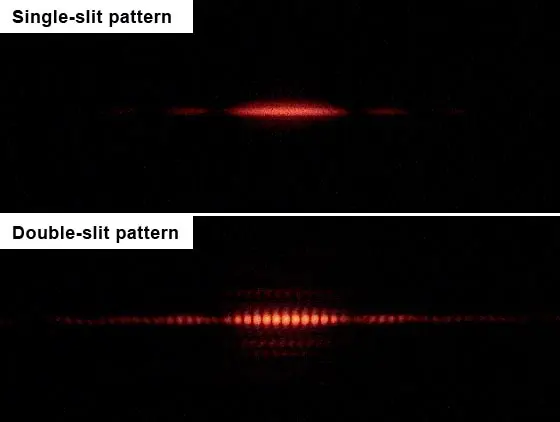 Two photographs of red laser light on a screen. Top, labelled single-slit pattern: a wide, bright central patch with much fainter, narrower patches on either side. Bottom, labelled double-slit pattern: the same overall shape, but divided into many narrow, equally spaced bright fringes.